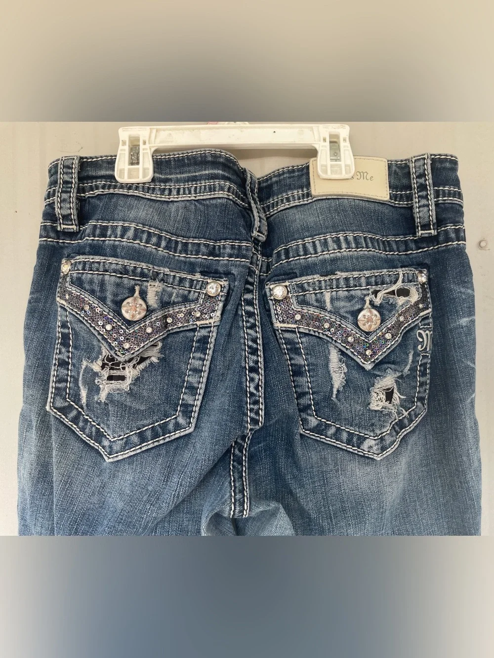 Miss Me Blue Flare Jeans with Contrast Stitching and bling back pockets.